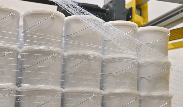 Buckets being wrapped using net film 