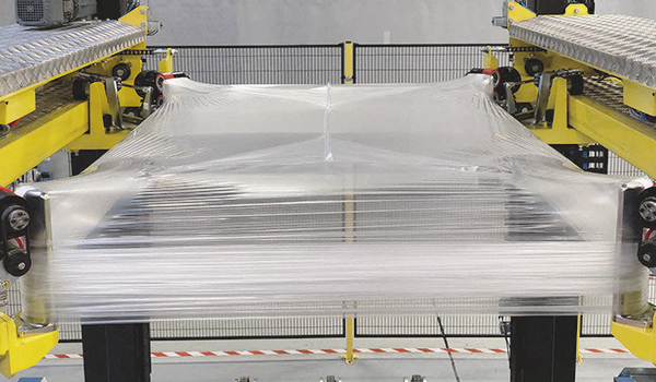 Stretch hooding on a lachenmeier machine