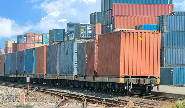 Rail shipping container for protective packaging