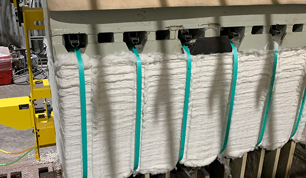 Cotton being strapped