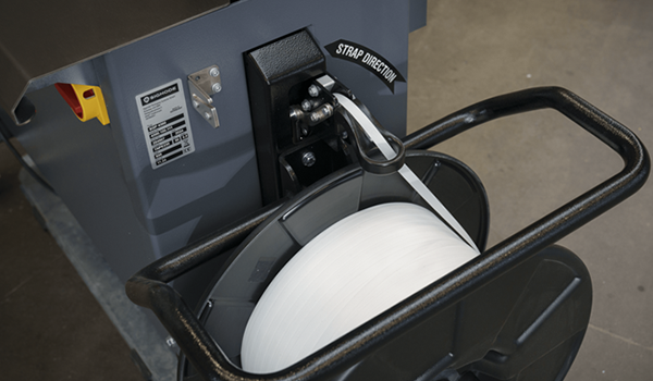 Embossed strap on general purpose machine